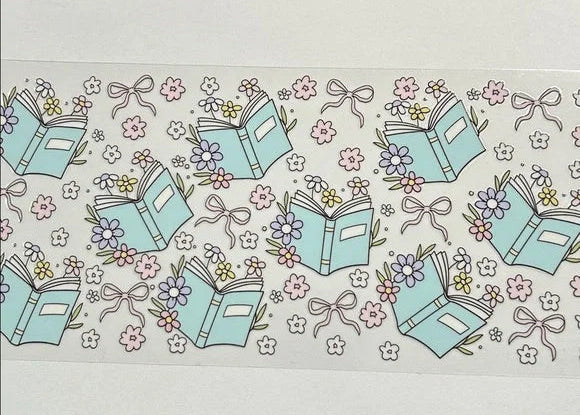 Pattern of books, flowers, and ribbons on a light background