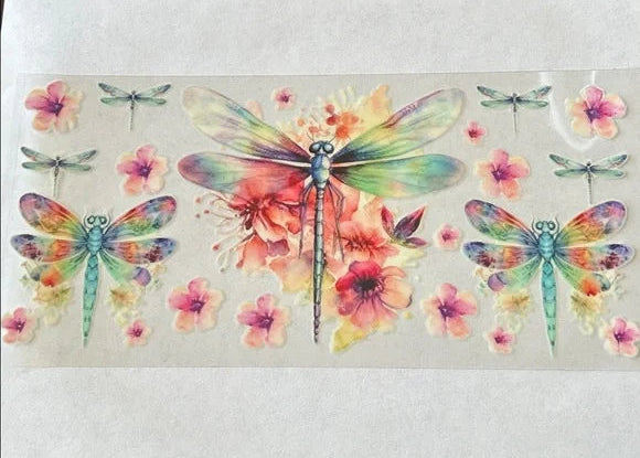 Colorful dragonfly and flower stickers on a clear background