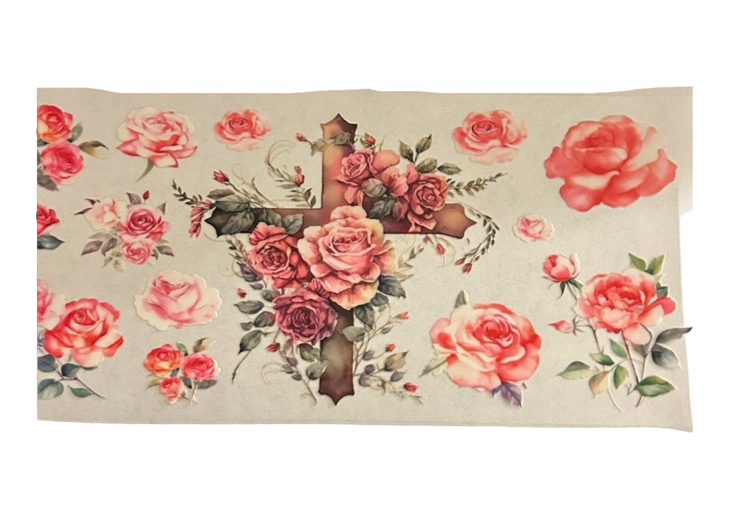 Floral design with roses and a cross on a beige background