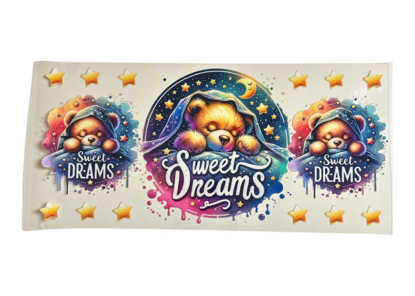 Colorful 'Sweet Dreams' bear design with stars on a white background
