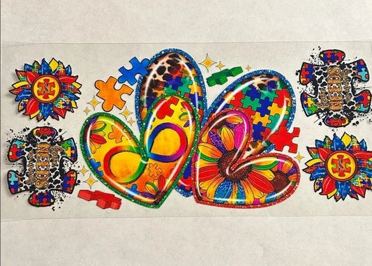 Colorful heart-shaped designs with puzzle pieces on a light background