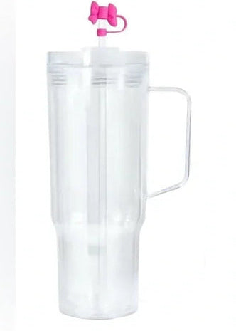 Clear tumbler with a pink lid on a white background