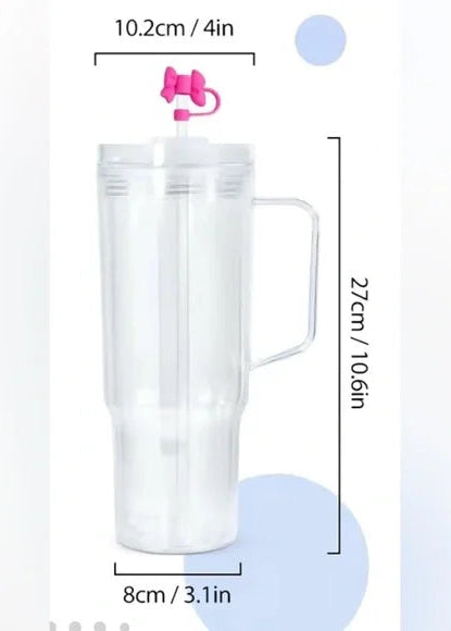 Transparent tumbler with a pink lid and handle, showing measurements on a white background.
