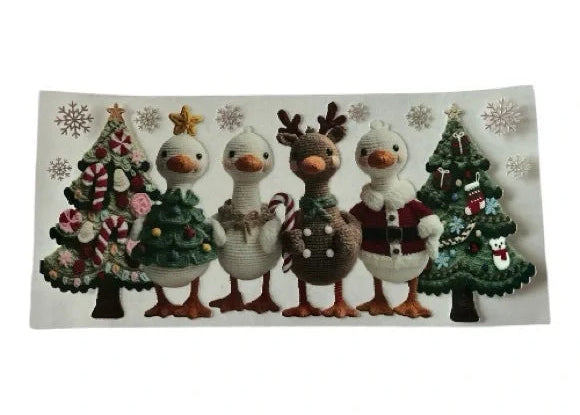 Set of Christmas-themed stickers including trees and geese on a decorative cup wrap with snowflakes.