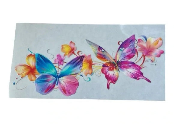 Custom cup wrap design featuring two large, detailed butterflies with multicolored wings in pink, blue, and purple, accented by bright yellow and orange tropical hibiscus flowers.