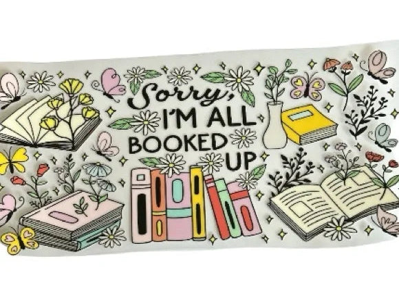 book themed cup wrap with sorry im all booked up text floral accents and stacked books design