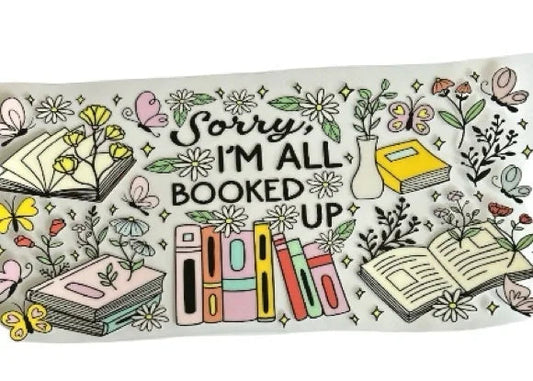 book themed cup wrap with sorry im all booked up text floral accents and stacked books design