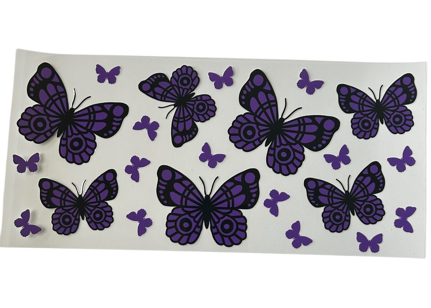 Purple butterfly pattern cup wrap with black and purple butterflies in multiple sizes