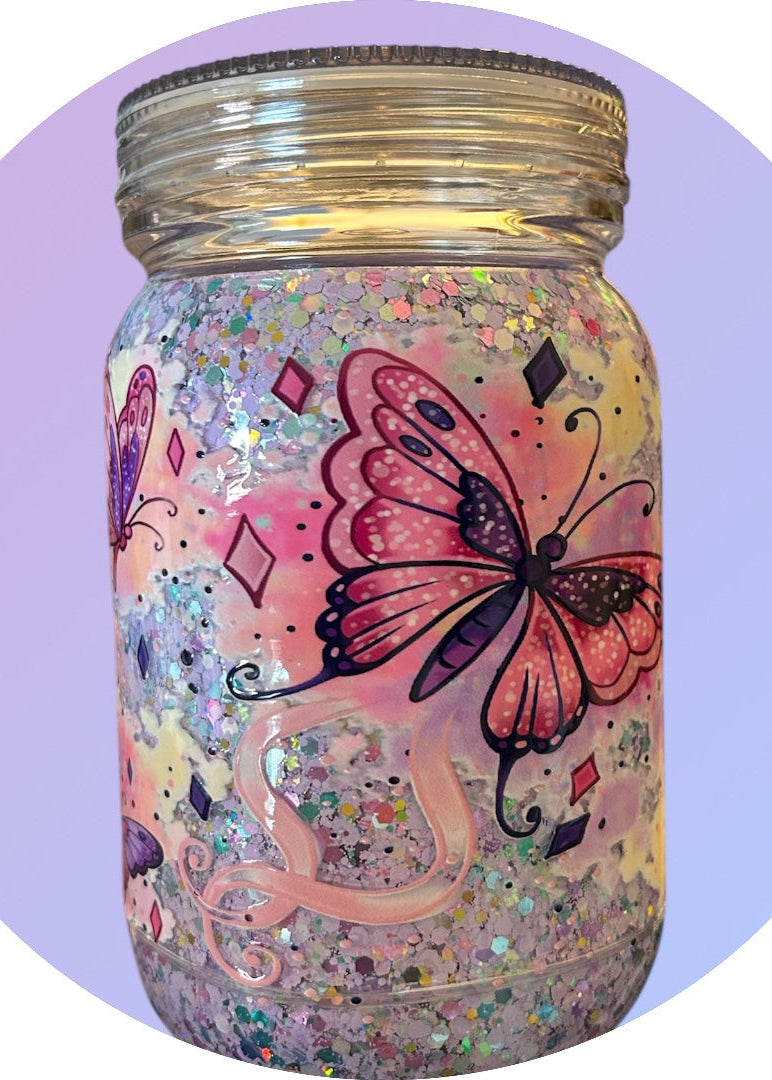 Decorative jar with a butterfly design and glitter on a purple background