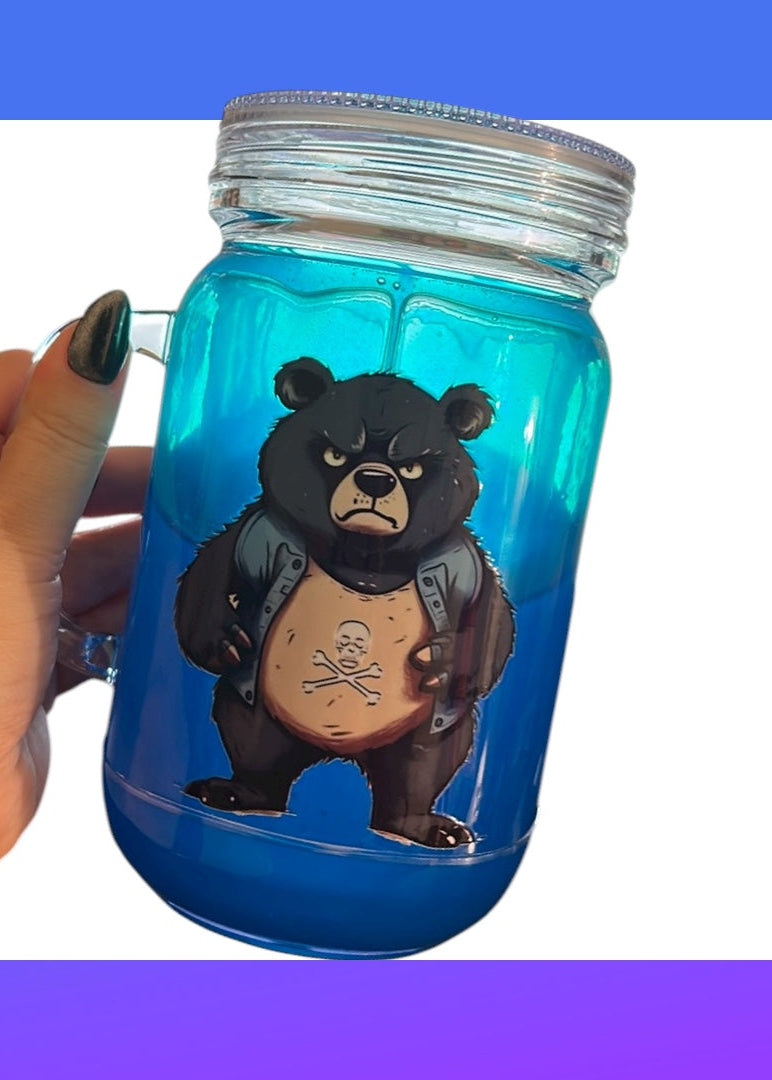 Blue mason jar with a bear design on a white background