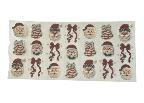 Sheet of decorative stickers featuring Santa Claus and bows on a clear background