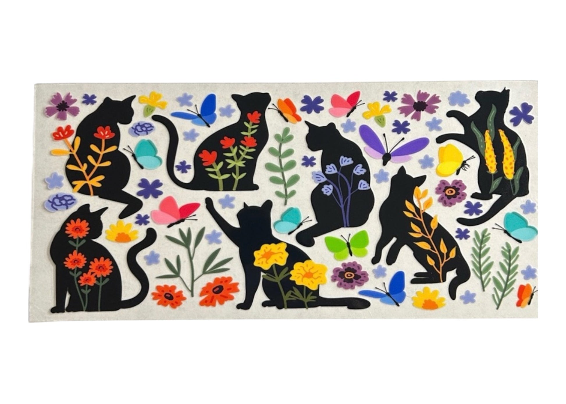 Decorative cup wrap with black cats, flowers, and butterflies on a white background