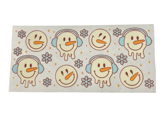 Sheet of stickers with snowman designs on a white background