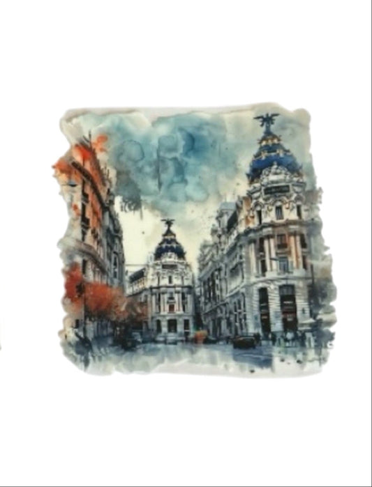 Artistic watercolor cup wrap design featuring the historic European architecture and domed roofs of the Gran Vía in Madrid, Spain, in shades of navy blue, terracotta, and cream.