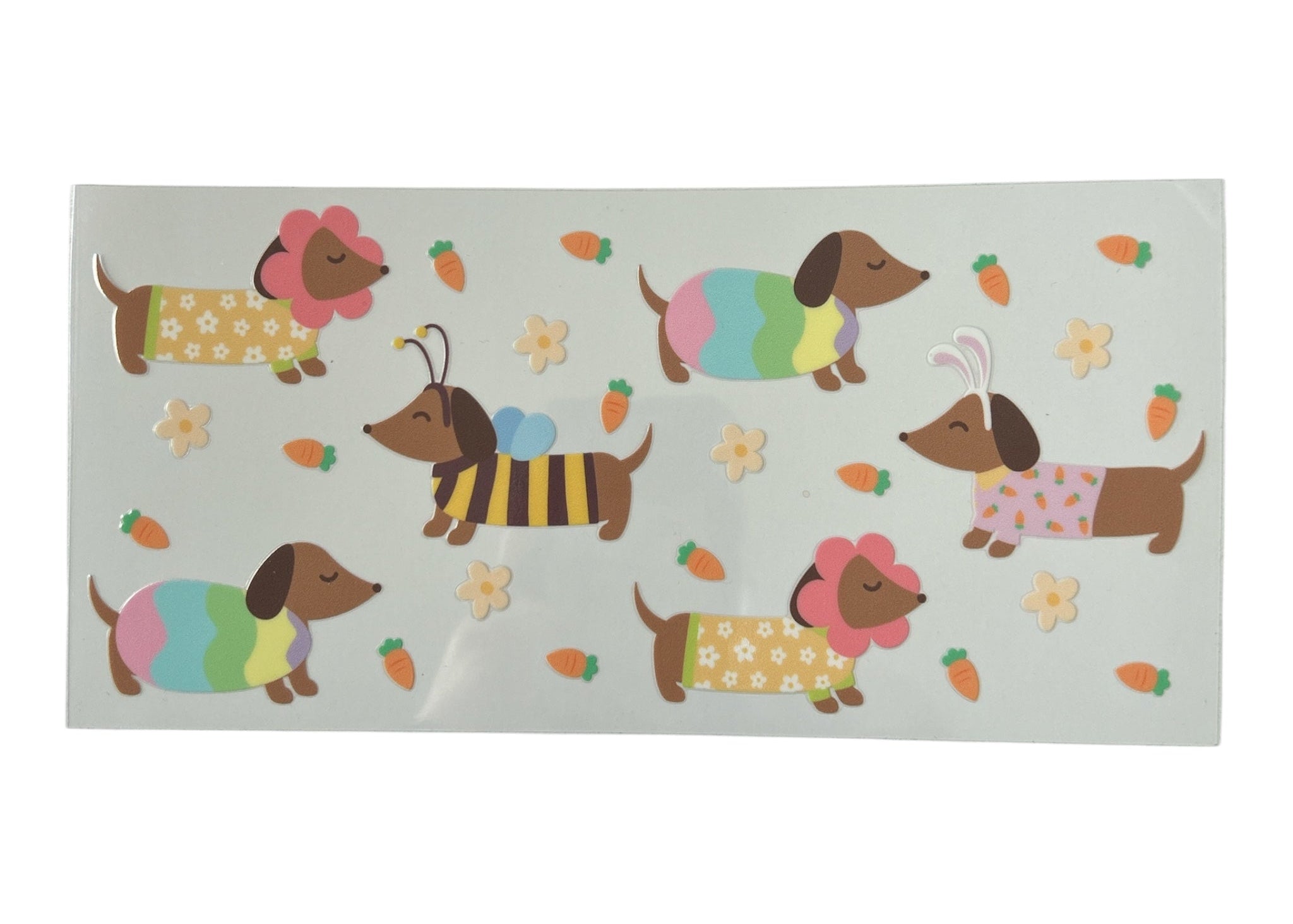 Sticker sheet with colorful dachshund illustrations on a clear background