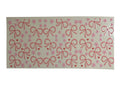 Rectangular cup wrap with pink bow and heart pattern on a clear background