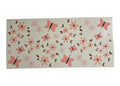 Floral and butterfly patterned cup wrap on a clear background