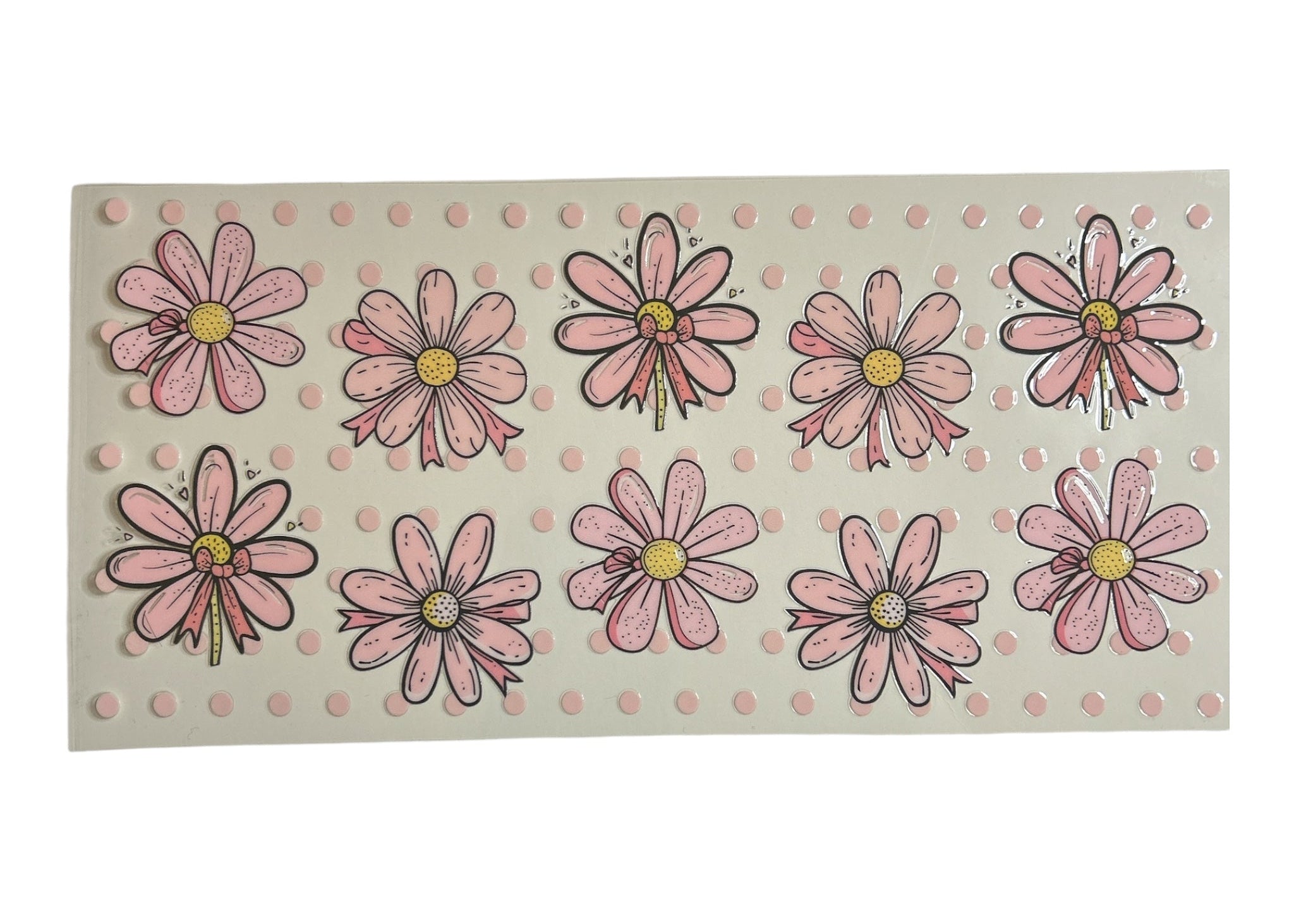 Rectangular decal with pink floral patterns on a clear background