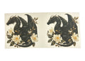 Two black dragons with floral accents on a clear background