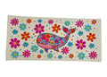 Colorful decal with a whale design and flowers on a white background