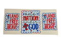 Three patriotic stickers with text on a beige background