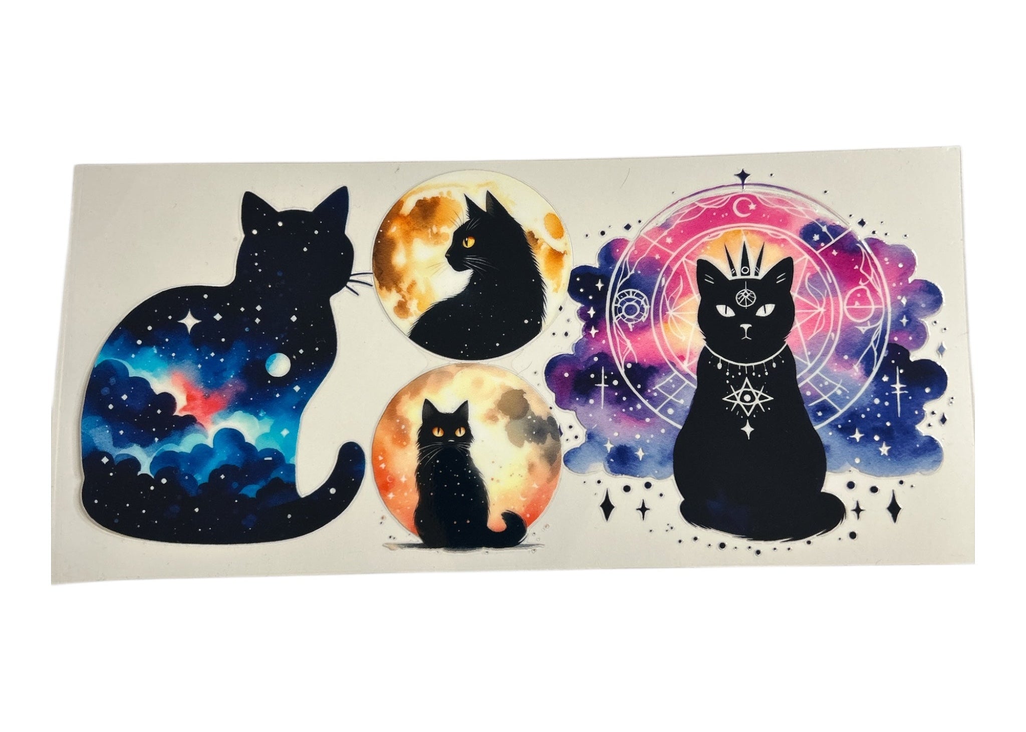 Set of black cat-themed Stickers with celestial designs on a clear background