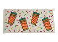Colorful cup wrap with donut-themed design on a clear background