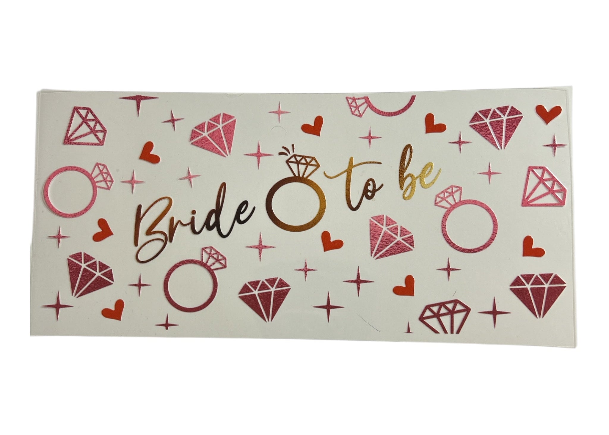 Decal with 'Bride to be' text and wedding ring and diamond designs on a clear background