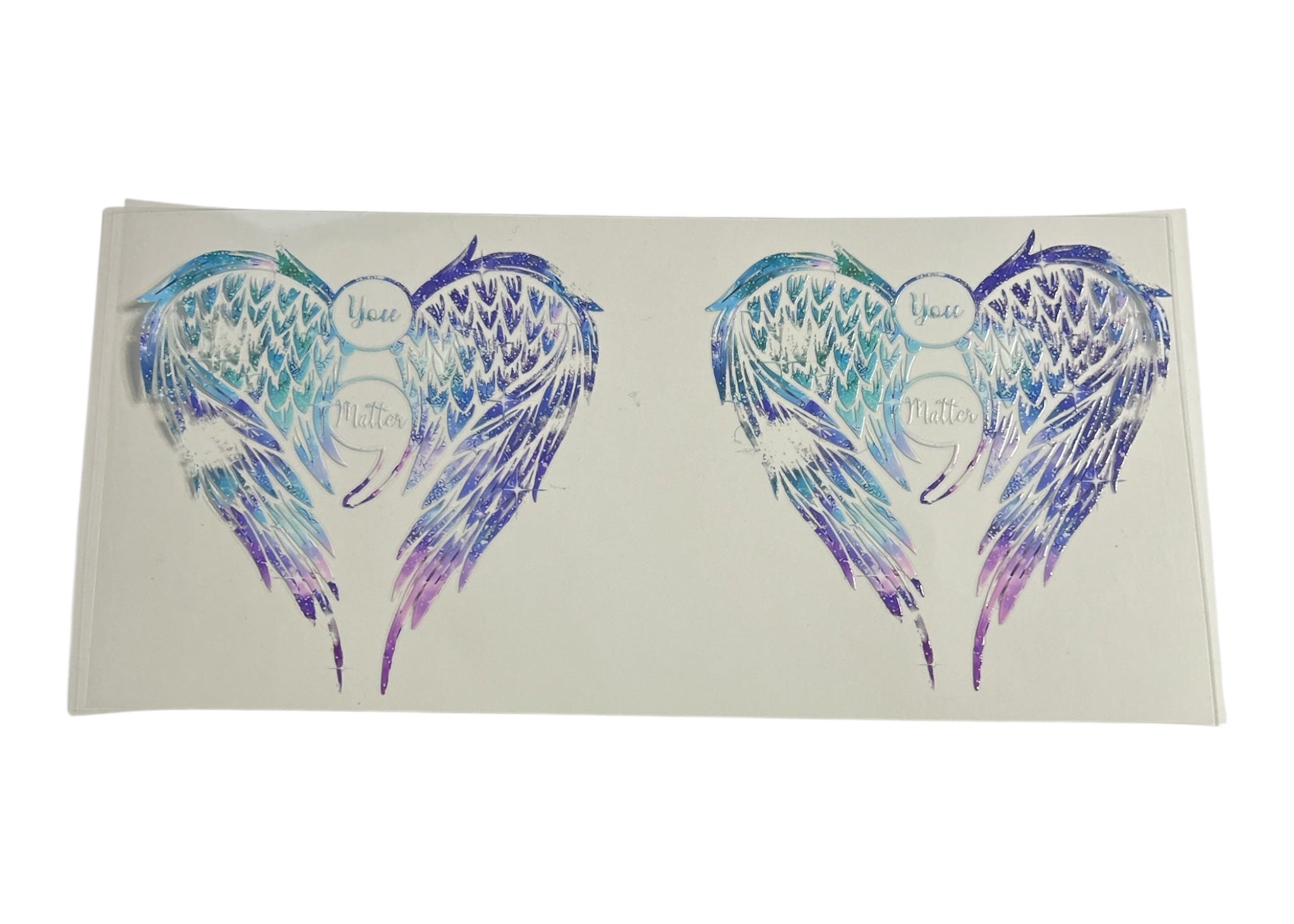 Colorful angel wings design on a white background