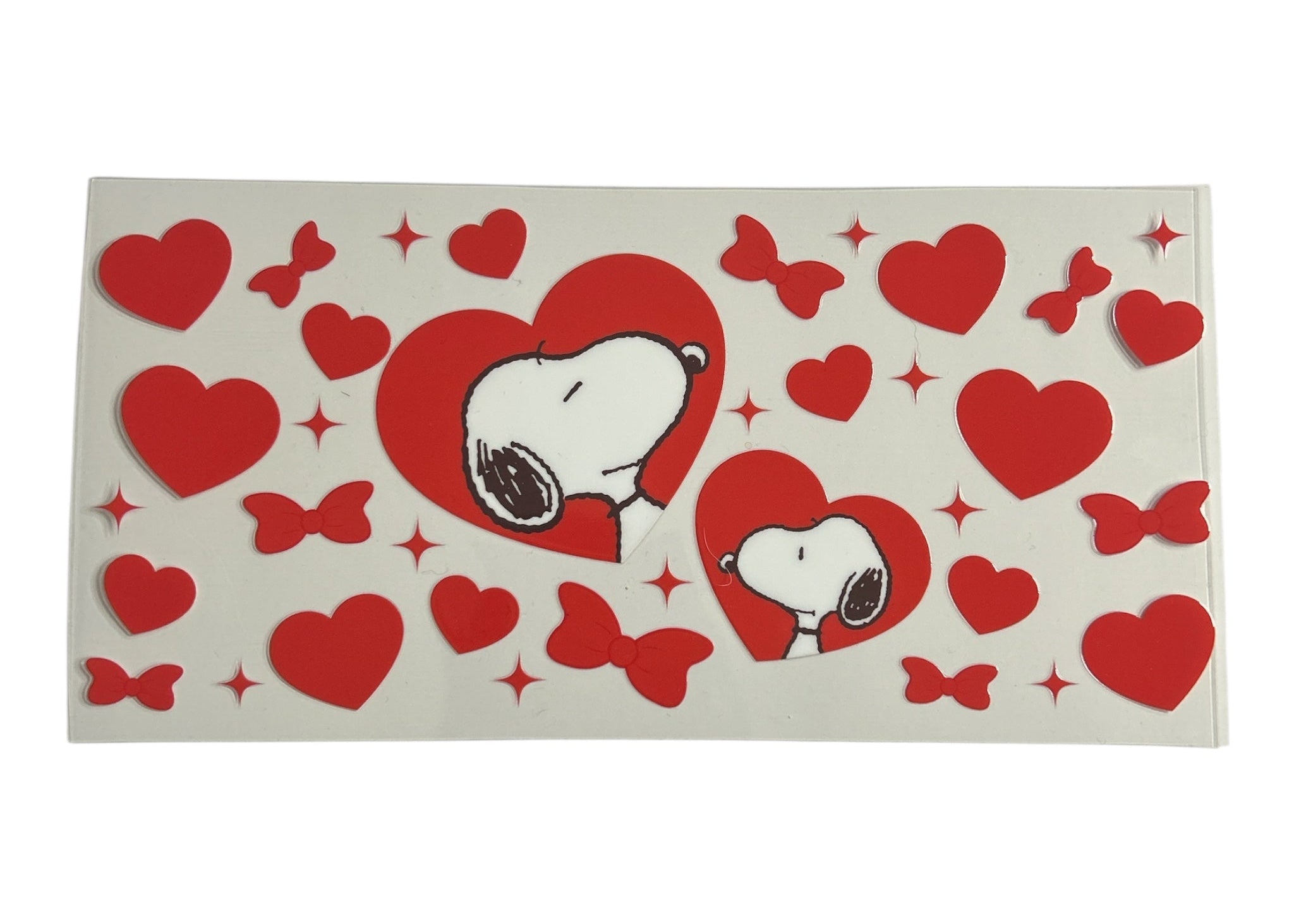 Sticker sheet with Snoopy in red hearts on a white background