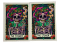 Two tarot card images with a skeleton and smoking plant design labeled 'The Stoner' on a clear background.