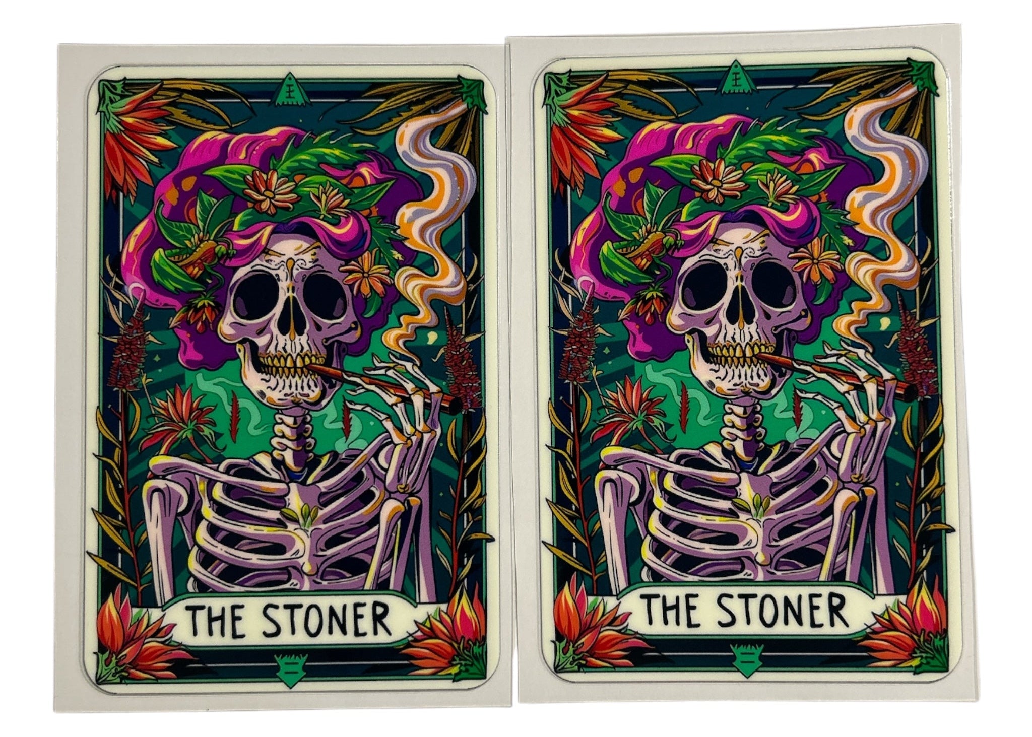 Two tarot card images with a skeleton and smoking plant design labeled 'The Stoner' on a clear background.