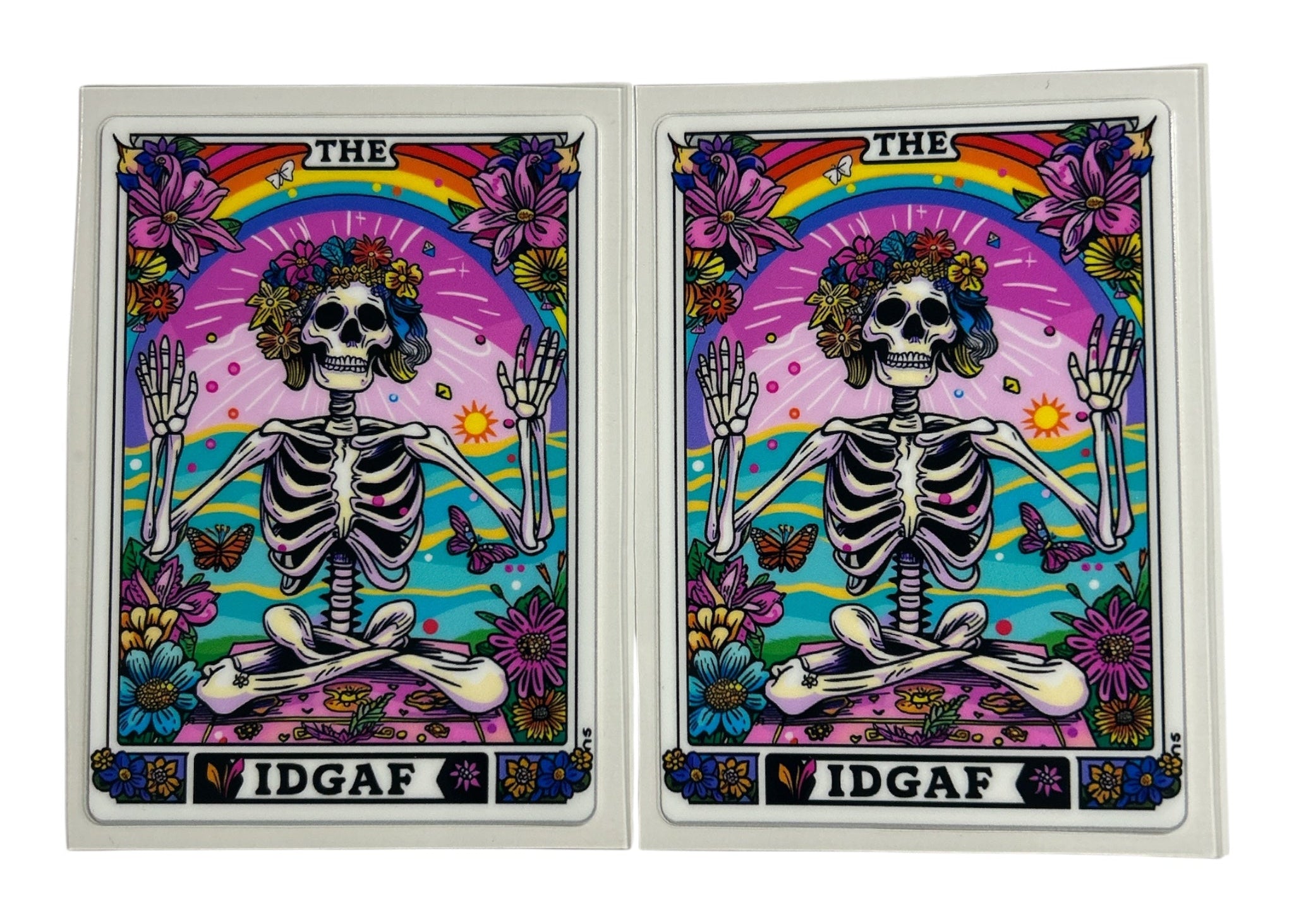 The IDGAF Tarot card cup wrap featuring skeletons, rainbows and flowers