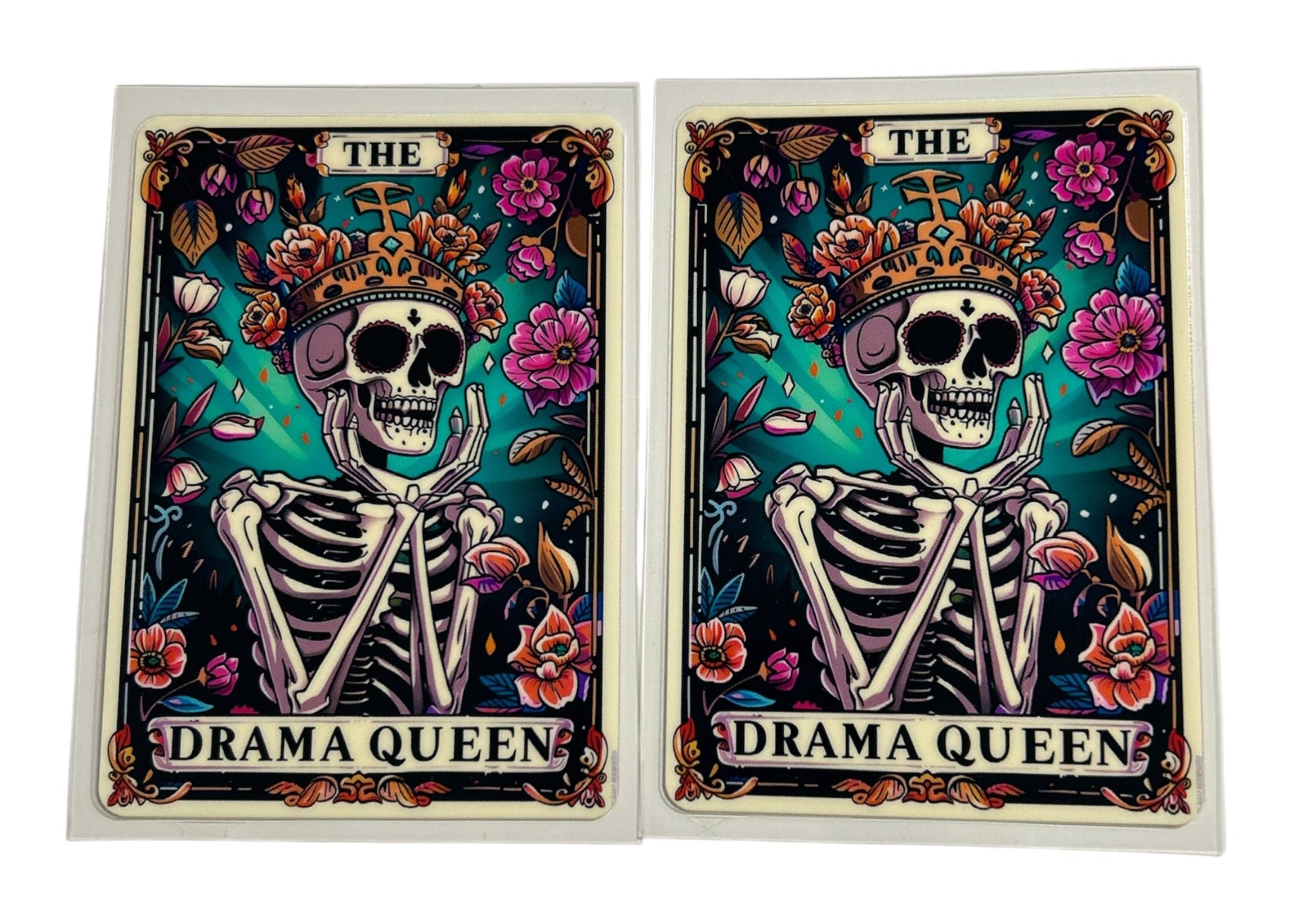 Two cards featuring a skeleton with flowers and the text 'The Drama Queen' on a white background.