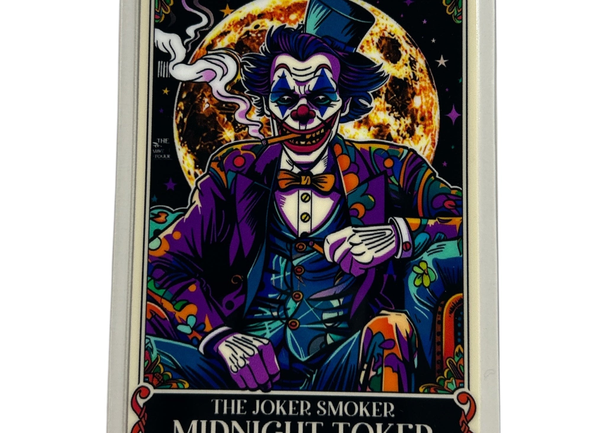 Decal of a stylized clown character with text 'The Joker Smoker Midnight Toker' against a moonlit sky.