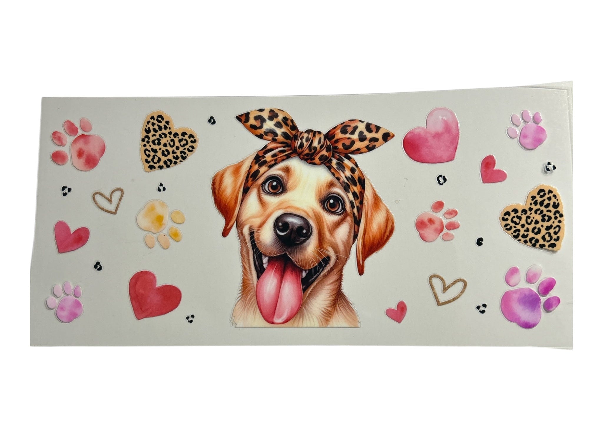 Sticker with a dog wearing a leopard print bandana surrounded by hearts, flowers, and paw prints on a light gray background.
