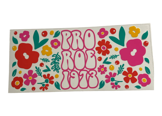 Sticker with floral design and 'PRO ROE 1973' text on a white background