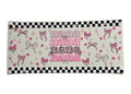 Decorative cup wrap with 'nana' text and pink bows on a checkered border.