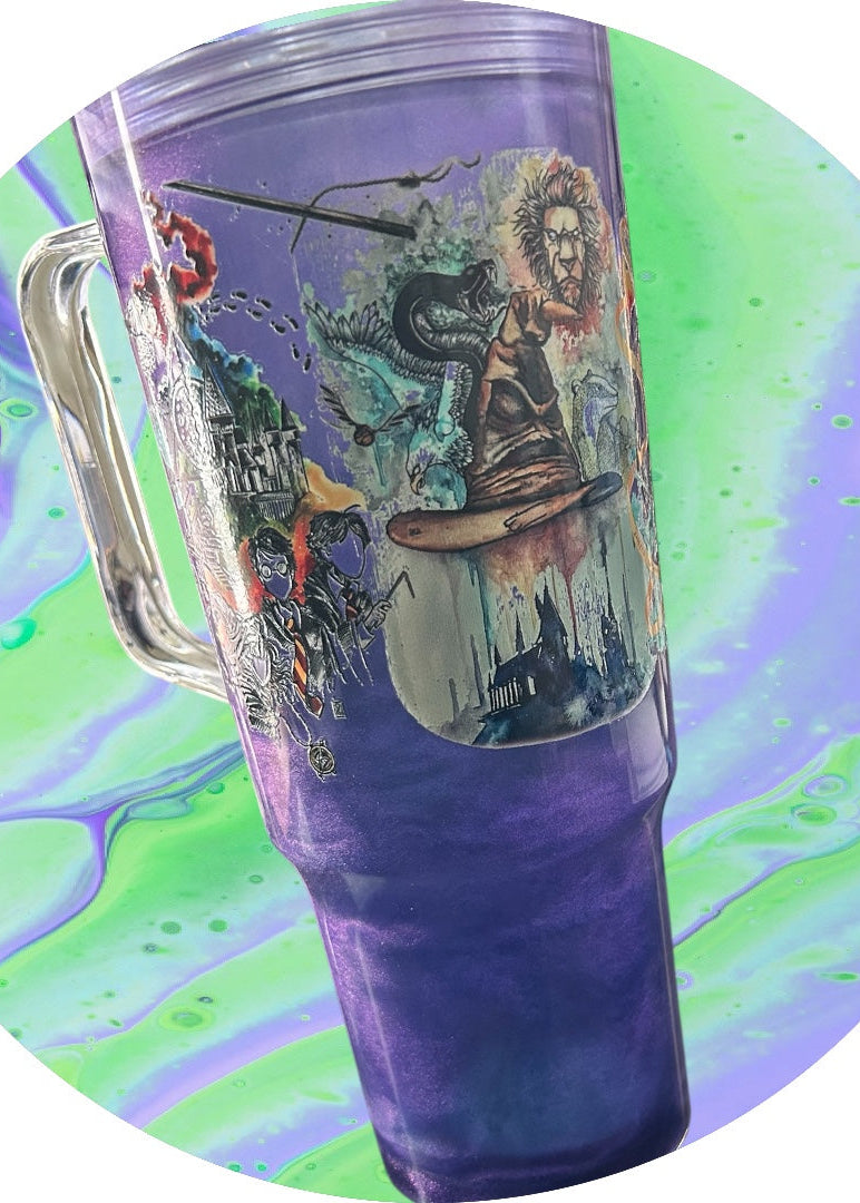 Tumbler with a colorful design on a green and purple marbled background