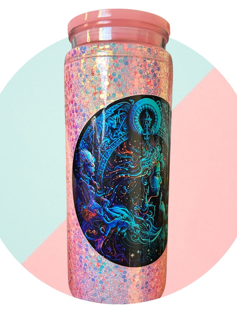 Tumbler with colorful design on a pastel pink and blue background