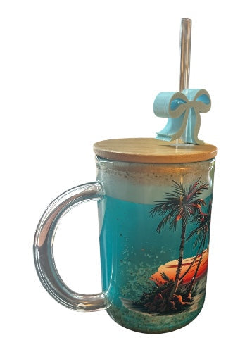 Tumbler with palm tree design, straw, and lid on a white background