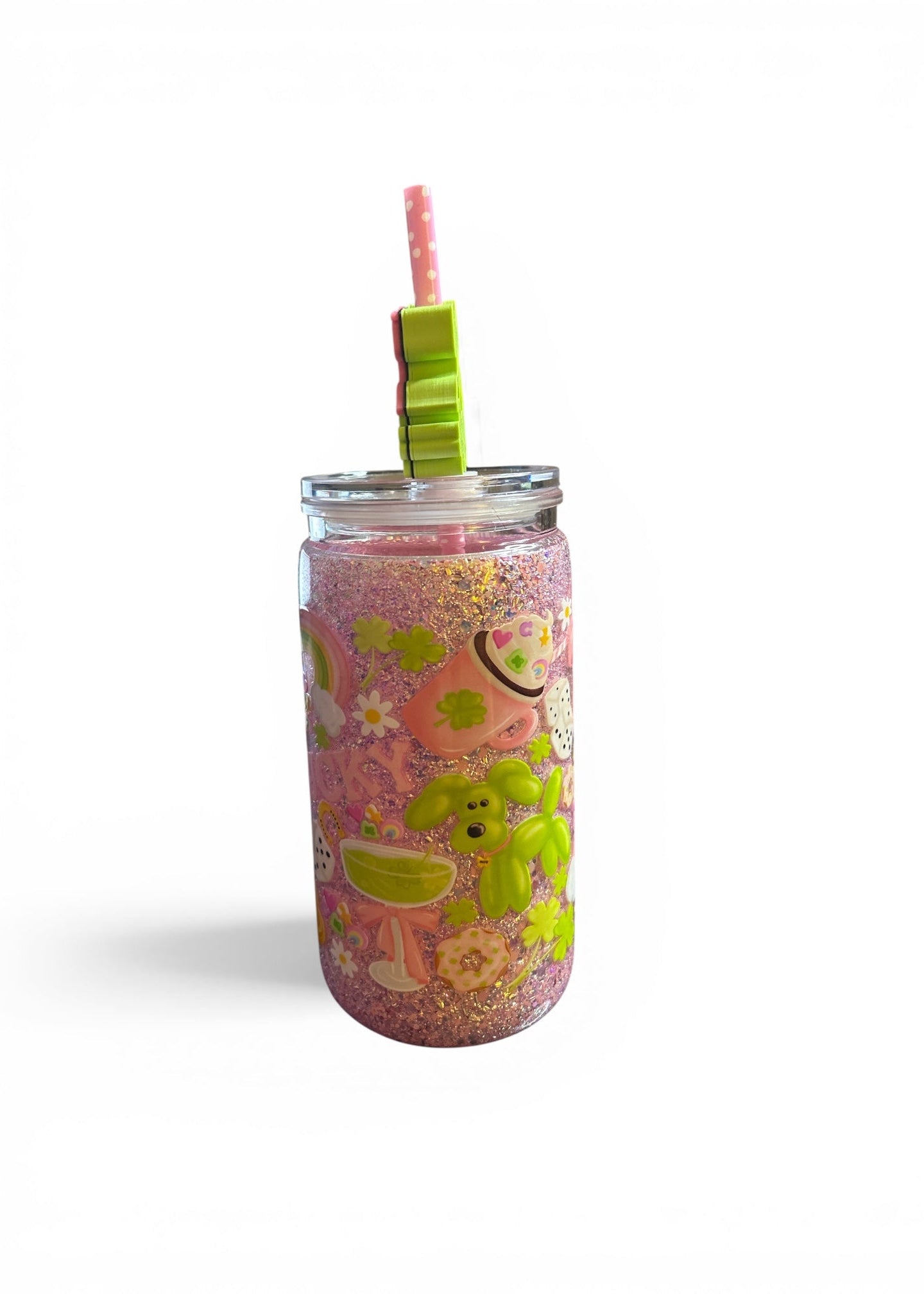 Colorful tumbler with a straw and decorative elements on a white background