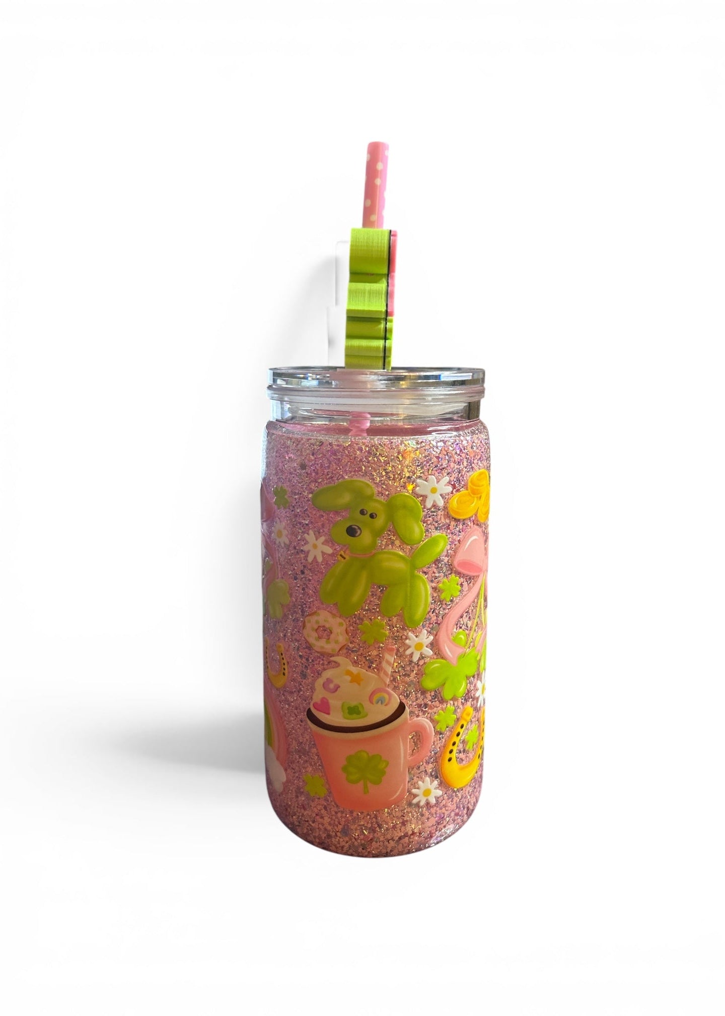 Decorative tumbler with a straw on a white background