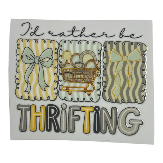 Decorative sticker with 'I'd rather be thrifting' text and shopping cart illustration on a white background.