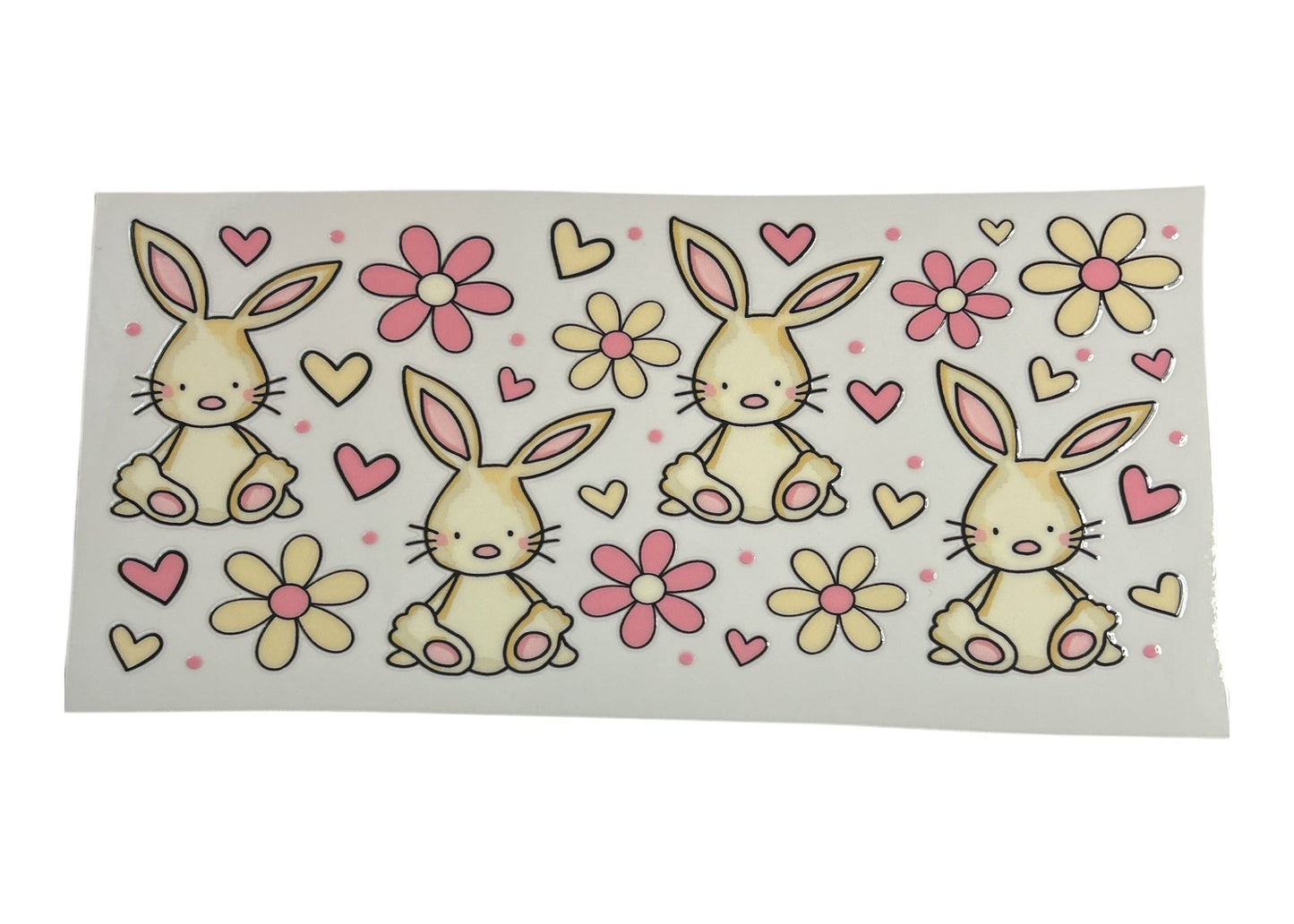 Sheet of stickers with cartoon bunnies and flowers on a white background