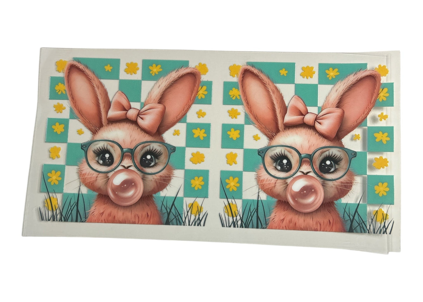 Two cartoon bunnies with glasses on a checkered background