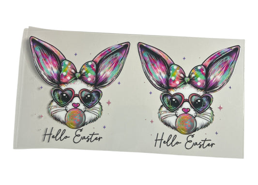 Two colorful Easter bunny designs with rainbow hearts and 'Hello Easter' text on a white background.