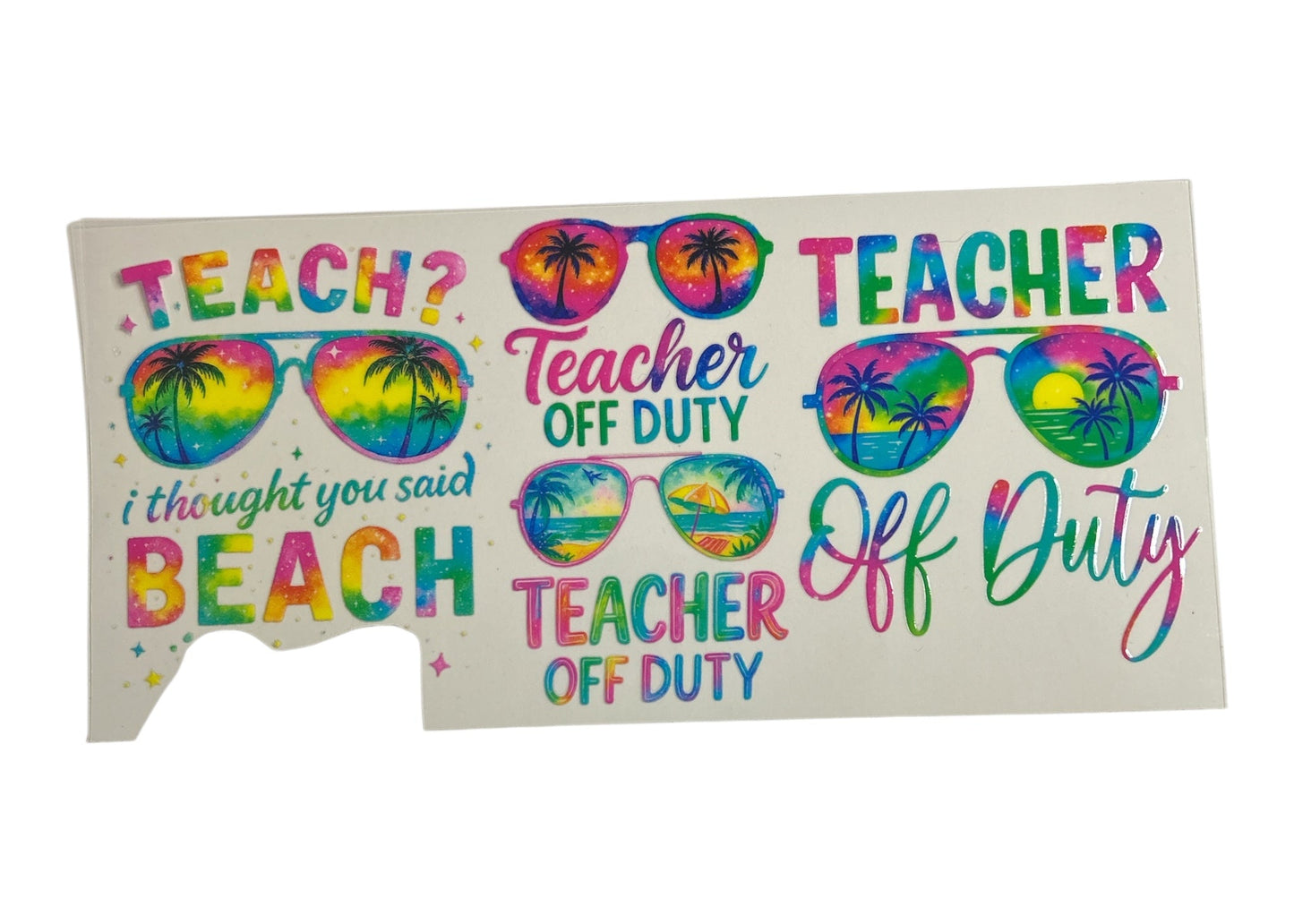 Colorful decal with sunglasses and 'teacher off duty' text on a clear background
