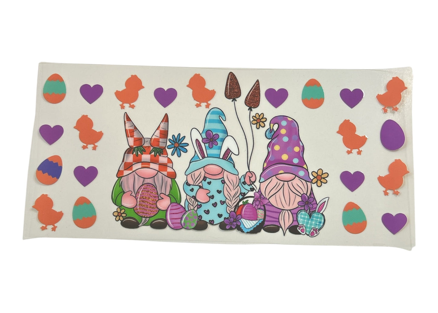 Decorative cup wrap with colorful gnomes and Easter elements on a clear background