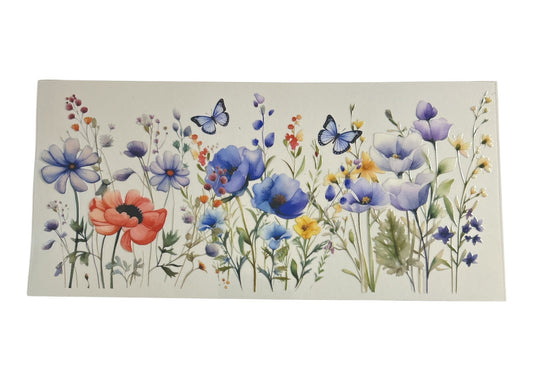 Rectangular cup wrap with colorful floral design on a clear background